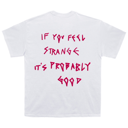 White unisex t-shirt featuring a pink snake print across the front and a pink text print on the back featuring "If you feel strange it's probably good" lyrics.